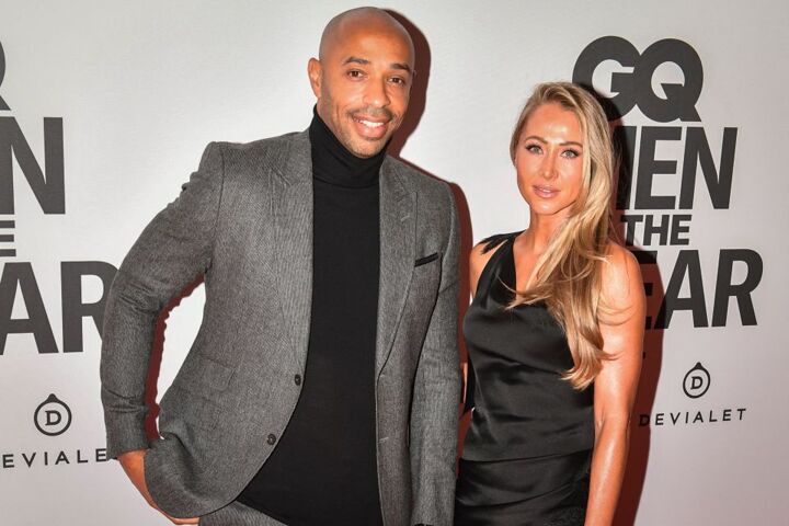 Henry poses with partner on red carpet as they bring the glam to GQ MOTY Awards