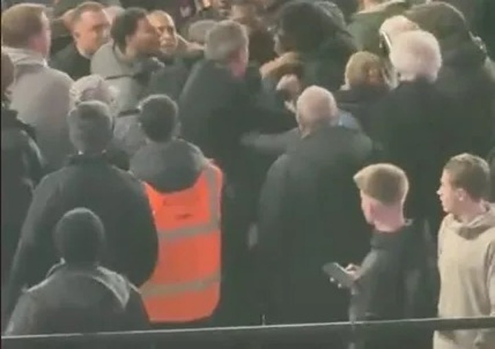 Moment huge brawl breaks out in West Ham end with punches thrown and fan knocked to ground in London derby vs Arsenal