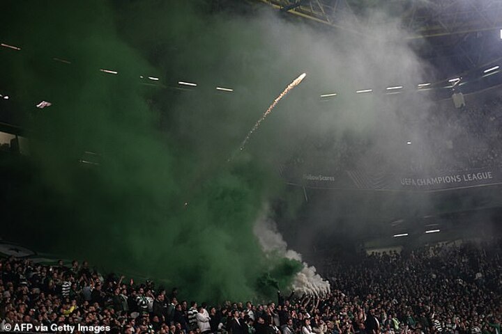 Sporting Lisbon fans cause chaos with fireworks during Arsenal clash