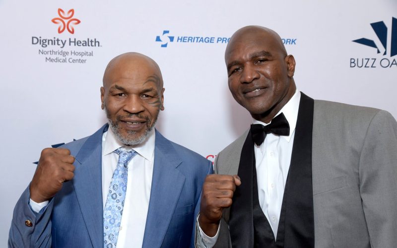 Mike Tyson gives Evander Holyfield his ear back as a Christmas present after biting it off in major boxing match