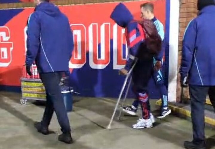 Worrying moment Bukayo Saka is spotted on crutches outside Selhurst Park