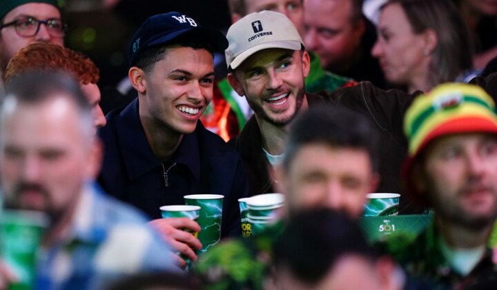 Maddison & Johnson grin at World Darts Championship hours after Spurs draw