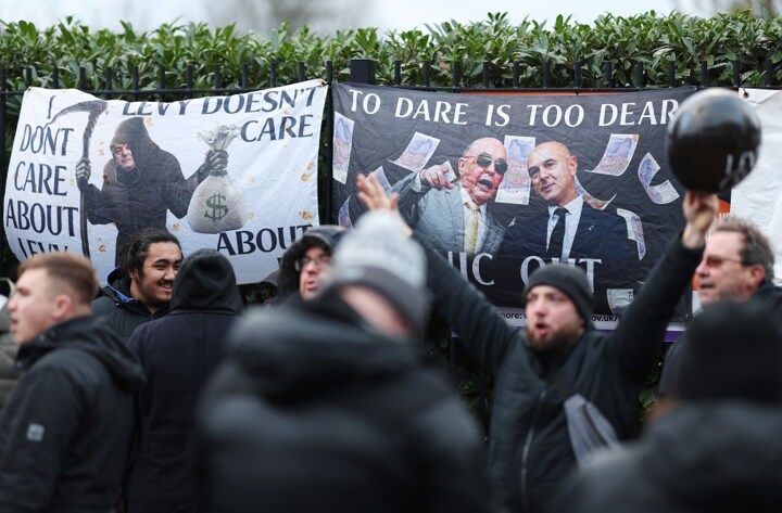 Tottenham fans protest ‘Levy out’ with black balloons as Spurs chairman akwardly watches on during Liverpool loss