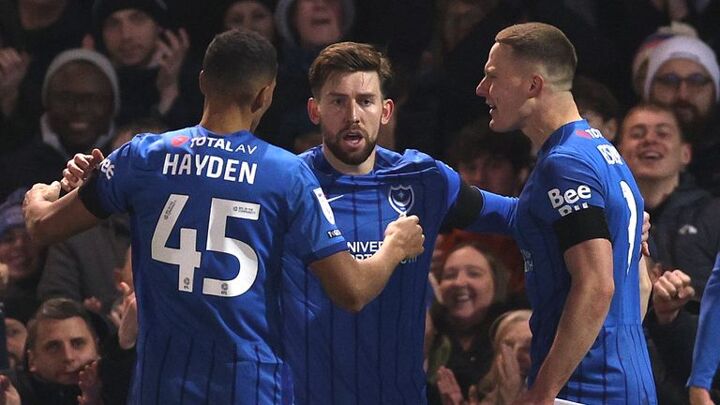 Portsmouth 3-1 Stoke City: John Mousinho celebrates two years in charge of Pompey with fourth straight home win