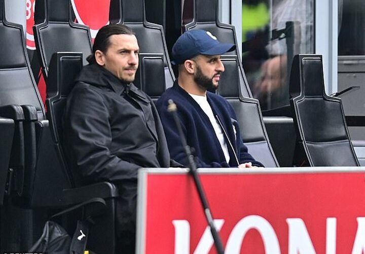 Kyle Walker watches his new team AC Milan in action alongside Zlatan Ibrahimovic