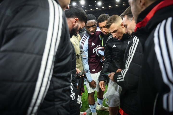 Villa stars anxiously huddle round phone to check UCL scores before celebrating