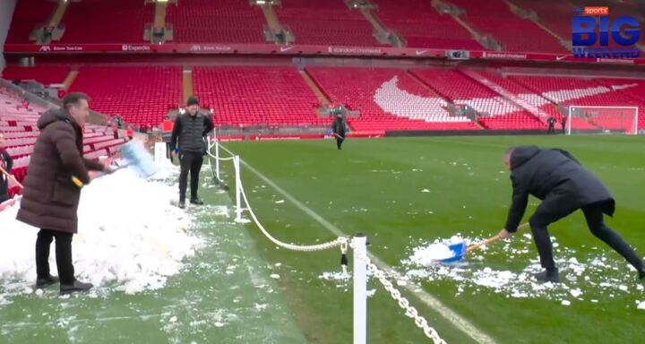 Neville shovels snow back to pitch, fans say he’s doing his best to call it off