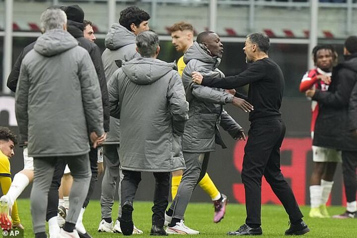 Milan boss and captain clash after last-gasp winner as Walker watches from stand