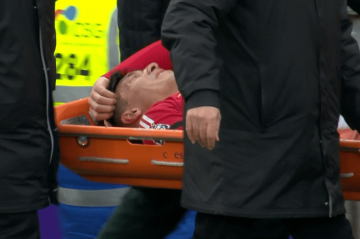 Lisandro Martinez stretchered off in tears after suffering a serious injury