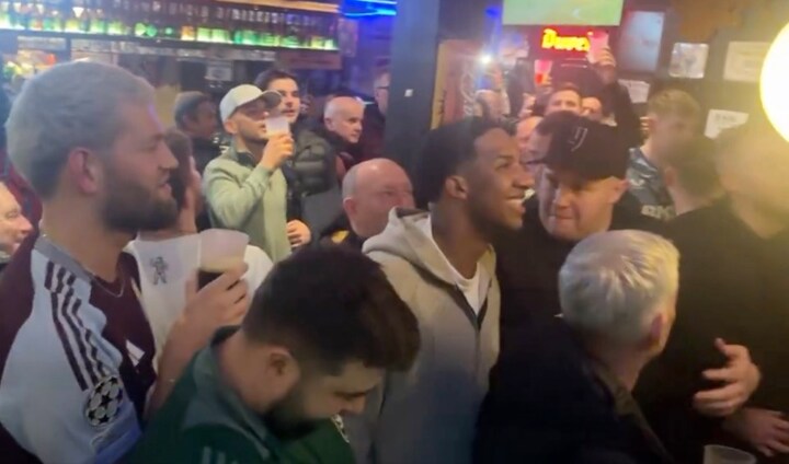 Rashford’s delighted brother joins noisy Villa fans in Bruges pub