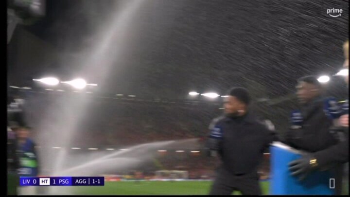 Rooney soaked by SPRINKLERS during half time of Liverpool vs PSG