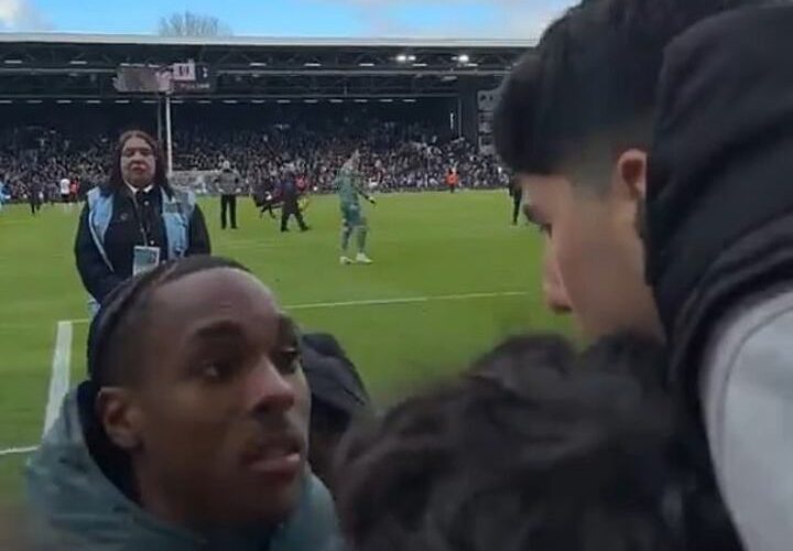 Tottenham forward Mathys Tel addresses angry supporters in the away end