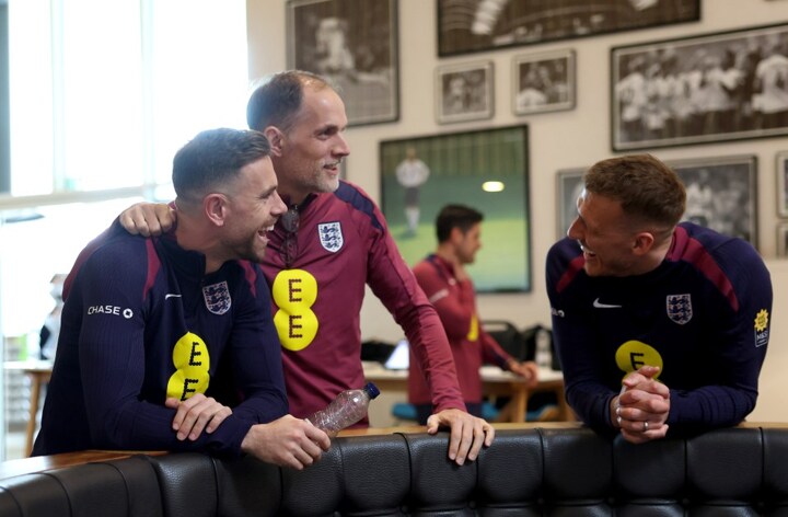 Thomas Tuchel shares hug with Dan Burn and Lewis-Skelly as England stars arrive at St George’s Park for double-header