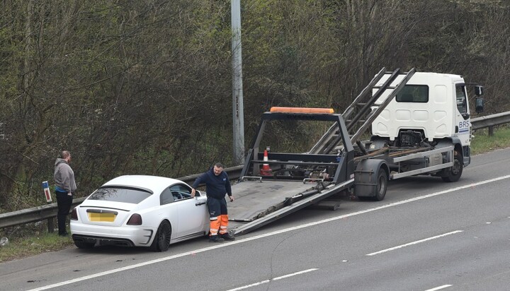 Moment Rashford’s £700k Rolls-Royce is towed off motorway after tyre blew out